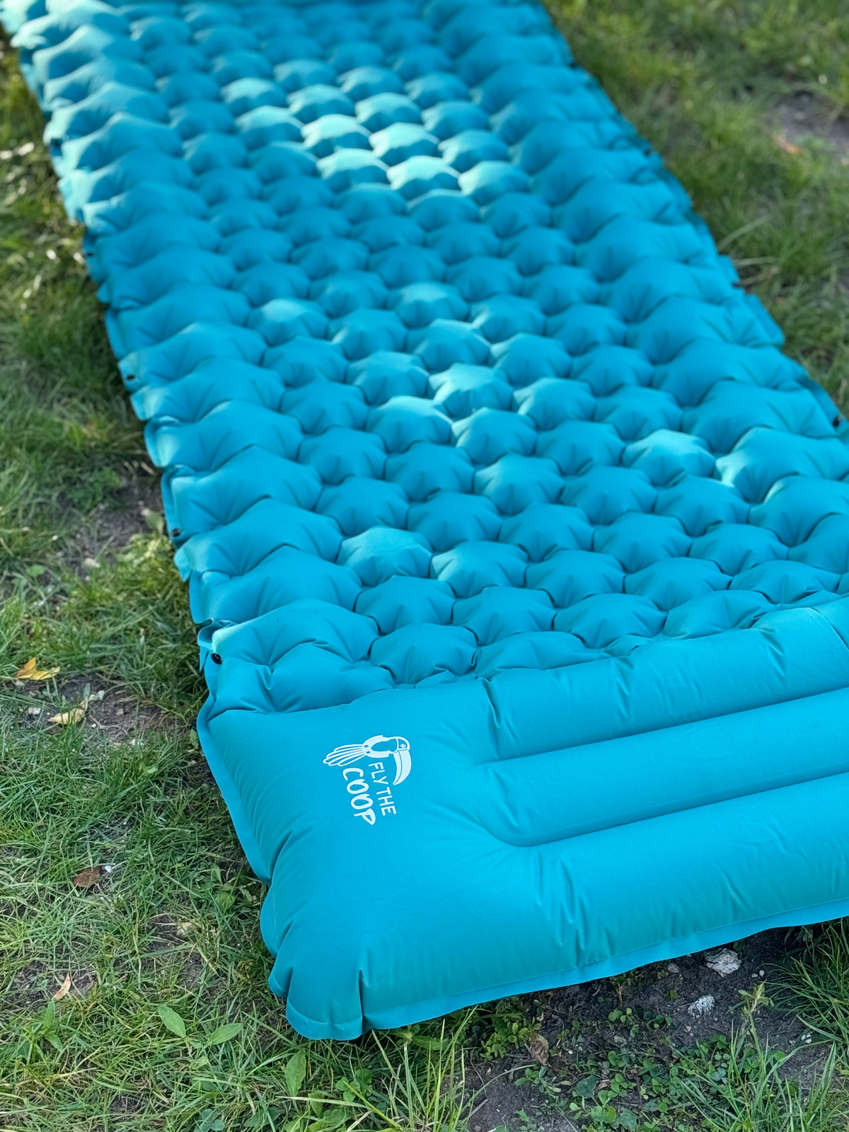 The Cloud camping mattress laid on grass outdoors — portable sleep Lebanon